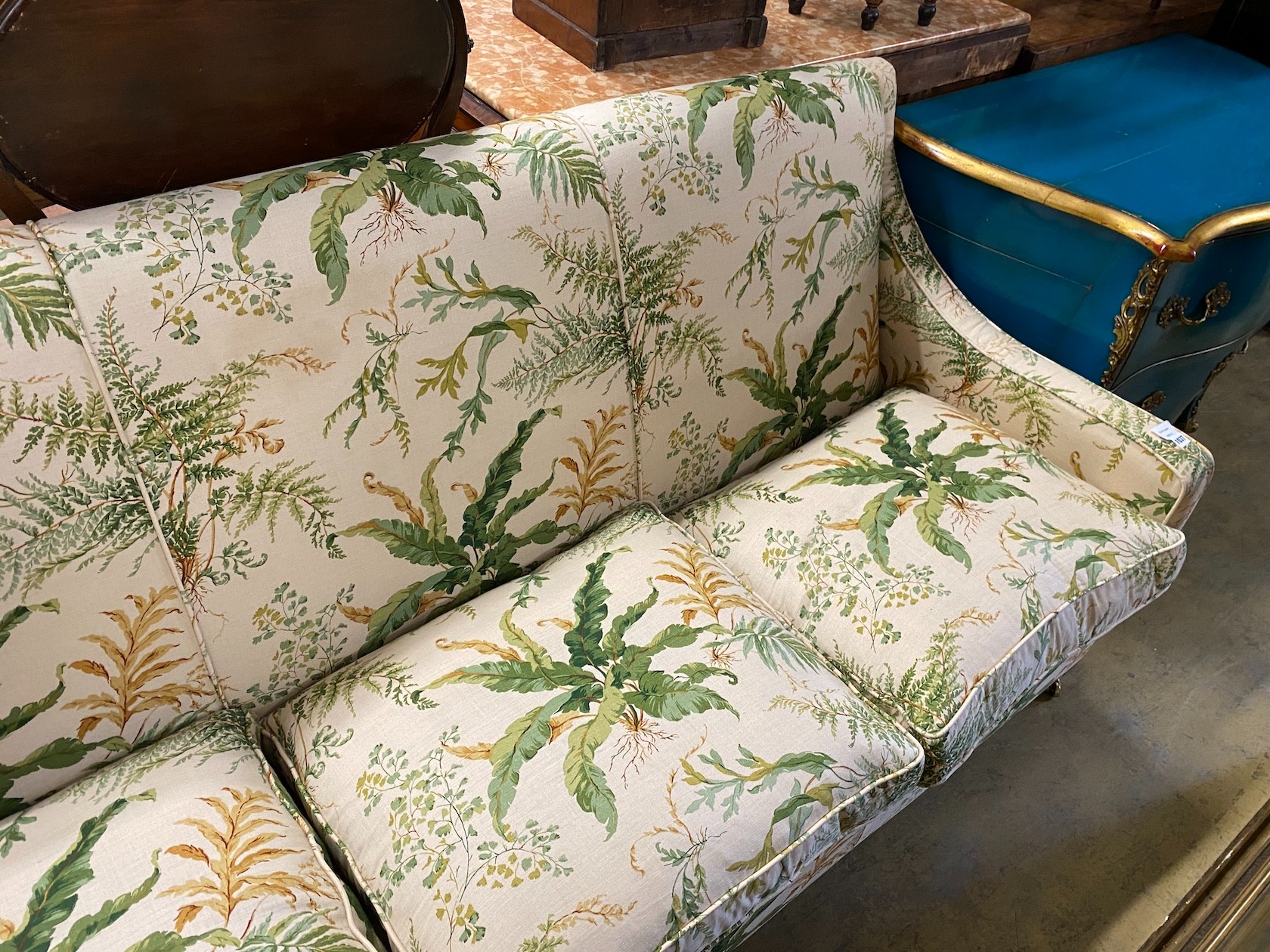 A “Highly Sprung Ltd” Colefax and Fowler fabric three seater sofa with feather cushion seats, width 210, depth 86cm, height 90cm.